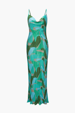 a green dress with a camouflage print on it