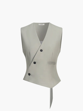 a white vest with a black button on the front