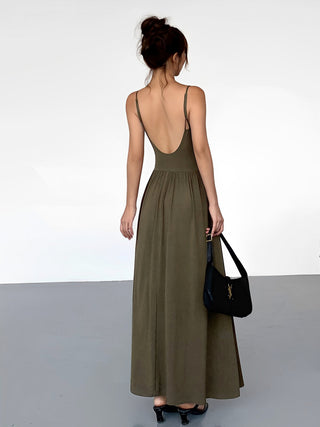 the back of a woman in a green dress