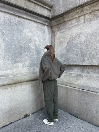 a person standing in front of a wall