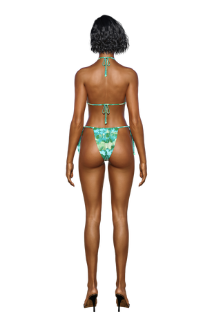 the back view of a woman in a green bikini