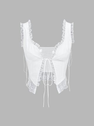 a white bra top with lace detailing