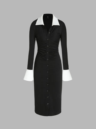 a black and white dress with a white collar