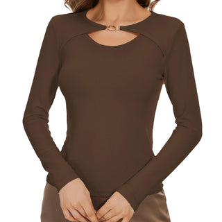 a woman wearing a brown long sleeved top