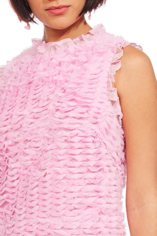 a woman wearing a pink feathered dress