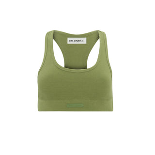 a women ' s green sports bra top