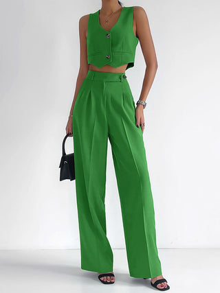 a woman in a green jumpsuit