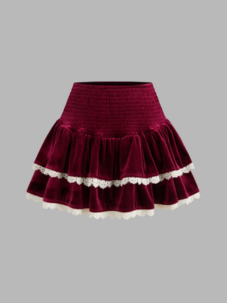 a maroon skirt with white lace trim and a white lace trim