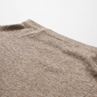 the back of a brown sweater with a white background