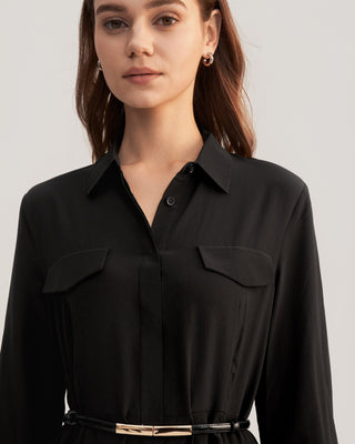 a woman wearing a black shirt dress with a belt