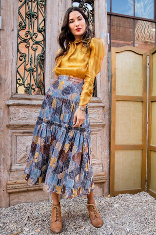 a woman standing in front of a wooden door